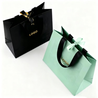 Sac en papier gaufré noir de luxe pour cadeaux, sac écologique, sacs en papier pour le shopping