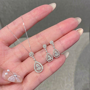Pendientes de Diamantes Naturales en Forma de Gota de Agua de 0.60ct, Oro Blanco de 18K, Corte Pera con Halo de Diamantes, Marca Xinfly - Product Image 1
