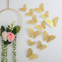 Vente en gros d'autocollants décoratifs pour chambre, 12 pièces, autocollants muraux amovibles en papillon 3D dorés pour fête d'anniversaire, mariage, décorations de salle de classe