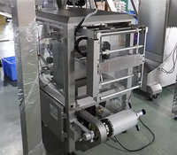 Machine d'emballage automatique verticale à quatre soudures pour riz, sucre, sel, céréales, noix
