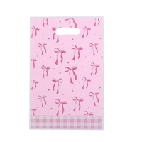 Sac en plastique rose à nœud papillon, motif dessin animé, mignon et frais, petit sac cadeau pour bijoux et vêtements, idéal pour Halloween, Noël, Pâques et autres événements.