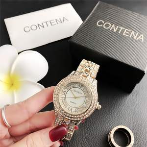 Reloj de platino Geneva a la moda para mujer, reloj de pulsera japonés movt al por mayor, relojes informales para estudiantes con banda de acero y diamantes de imitación para mujer - Product Image 1