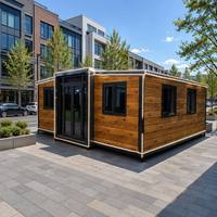 Maison Modulaire en Planches de Bois avec Éclairage LED, Conteneur Extensible, Cadre Noir, Bureau Mobile Urbain pour Place Publique, Vente en Gros OEM
