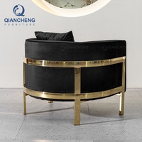 Fauteuil inclinable de salon en velours noir foncé pour chambre d'hôtel, avec coussins
