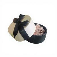 Boîte cadeau ronde de luxe personnalisée avec ruban noir, boîte d'emballage cylindrique rigide élégante pour les cadeaux de mariage et d'anniversaire