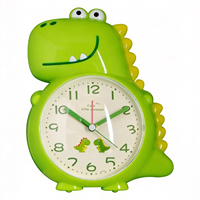 Dinosaurier-förmiger Tisch-Wecker, mit Wechselbarer Melodie & Simulierter Klingel, Schlummerfunktion & Nachtlicht, Niedlich und Vielseitig für Kinder