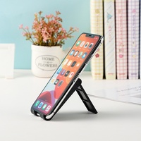 Nouveau support de téléphone de bureau en plastique mignon, style épuré, support réglable et pliable pour téléphone et tablette, disponible en gros en Chine