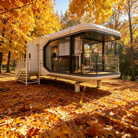 Maison capsule moderne en aluminium durable et sécurisée, structure mobile et portable, alimentée à l'énergie solaire, écologique, salon, hôtel, appartement