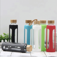 Bouteille d'eau en verre borosilicaté écologique avec couvercle en silicone DAJI HYDRO personnalisable et réutilisable pour l'extérieur