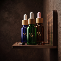 Flacon compte-gouttes pour huiles essentielles, bleu, vert, ambre, 5ml-100ml, en verre vide, impression sérigraphique, boîte en tube de carton, vente en gros