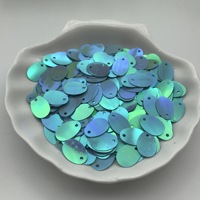 Vente en gros usine de paillettes ovales en PET 9*13 en forme d'œuf pour vêtements de scène, emballage de perles et décoration de sacs cosmétiques 26050701
