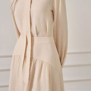 กระโปรงแมกซี่เทรนด์2025กระโปรงออกงานดีไซน์ใหม่สำหรับผู้หญิงกระโปรงมิดิ tegan อินเทรนด์ของผู้หญิงจากเวียดนาม - Product Image 1