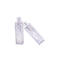 Desain Baru Pabrik Zibo 10Ml Botol Kaca Parfum Bening Ukiran Bunga dengan Tutup Penyemprot