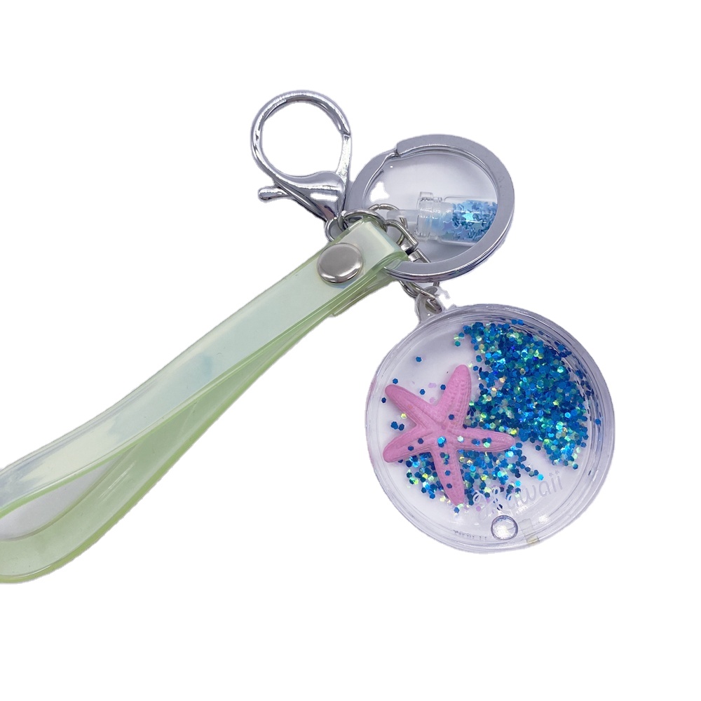 キーホルダー液体ホログラムグリッターキーリングの中に水オイル