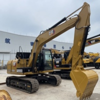 CAT 313D2GC d'occasion stable pour la construction ferroviaire et la manutention de lestage, destiné aux projets de fondation de voies et de construction de gares