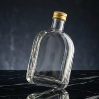 Bouteille en verre rectangulaire plate personnalisable, idéale pour les jus, les boissons et les boissons froides, avec des couvercles dorés
