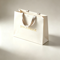 Sacs en papier kraft personnalisés pour le commerce de détail, sacs cadeaux pour vêtements, sacs d'emballage miniatures de luxe avec poignée, sacs en papier imprimés avec logos