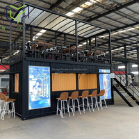 Bar modulaire préfabriqué en conteneur maritime avec structure en acier et panneaux sandwich Magic House pour usage commercial et en promotion