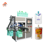 Machine de remplissage semi-automatique de jus liquide pur en sachet à bec verseur, sachet doypack, machine de remplissage et de bouchage de lotion de 1 litre