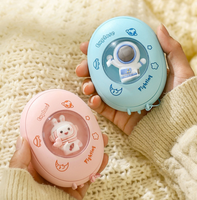 Mini chauffe-mains portable rechargeable par USB avec lumière d'ambiance de dessin animé