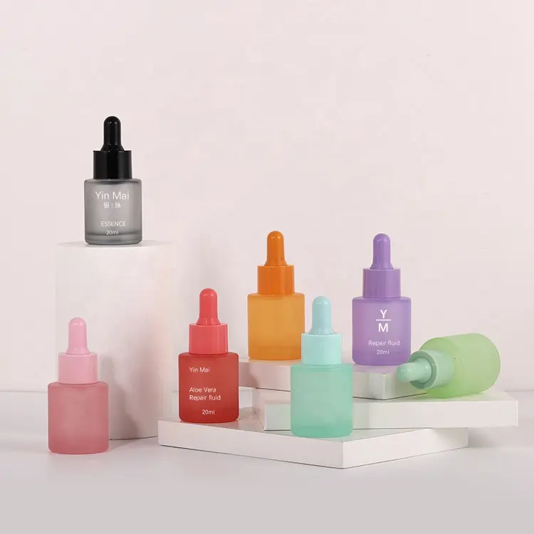 Bottiglia a forma di cilindro a spalla piatta nero bianco rosa blu viola oro rosa bottiglia per siero per la cura della pelle flacone contagocce in vetro da 20ml