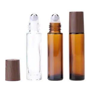 Yeni boş 5ml 10ml Amber mavi temizle Deodorant Attar uçucu yağ ahşap tahıl kapaklar ile cam şişeler üzerinde rulo