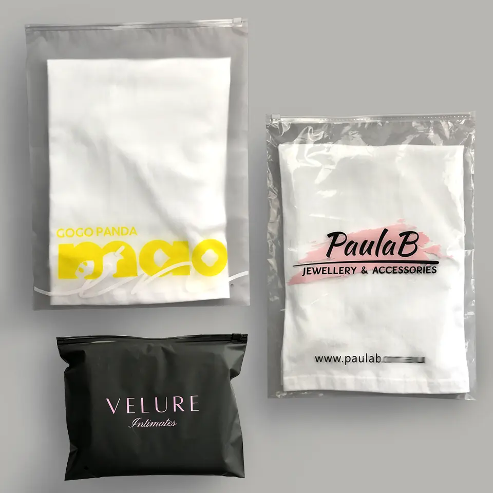 Vente en gros personnalisée sacs à fermeture éclair transparents pour vêtement en PE sac en plastique auto-scellant avec logo imprimé