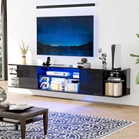 Meuble TV mural flottant noir moderne à finition brillante avec éclairage LED, prises électriques et étagères de rangement pour salon