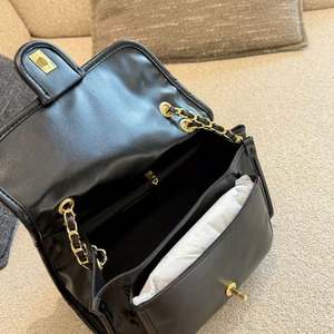 กระเป๋าถือหนังแท้คุณภาพสูงระดับไฮเอนด์สำหรับผู้หญิง ดีไซน์หรูหรา กันน้ำ เหมาะสำหรับฤดูใบไม้ผลิ ฤดูใบไม้ร่วง และชายหาด - Product Image 6