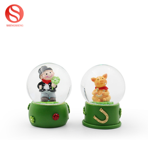 Personnalisé tyrannosaure écologique enfant cadeau LED lumière musique rotation neige céramique dinosaure boule à neige - Product Image 6