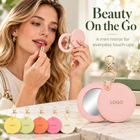 Miroir de maquillage rond en cuir PU avec logo personnalisé, poche simple face, couvercle rotatif et clip porte-clés pour sacs à main
