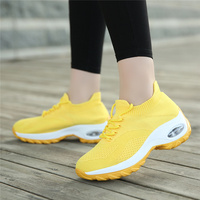 Chaussures décontractées pour femmes en tricot, design tendance, chaussures de sport respirantes, semelle élastique, vente en gros, baskets originales pour femmes
