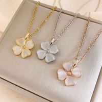 Collier pour femme en acier titane, motif trèfle à quatre feuilles et œil de chat, style estival, simple, polyvalent, accessoire très tendance pour l'été