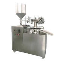 Machine de remplissage, de scellement et de sertissage de tubes en aluminium pliables pour peinture et pommade
