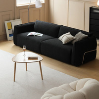 Ensemble de canapés sectionnels modernes avec rembourrage en éponge, tissu en fausse fourrure de mouton noir, design luxueux léger pour petit salon