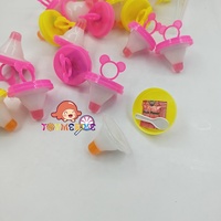 Vente en gros en vrac sac bouteille emballage Halal gelée pouding bonbons avec des bonbons à éclater saveur fruitée doux mamelon gelée