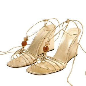 Sandalias de cuña metálicas doradas para mujer al por mayor, con <span class=keywords><strong>tiras</strong></span>, cordones, pedrería, tacones altos, sexys, para fiesta de verano, zapatos de moda - Product Image 1
