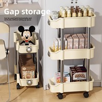 Étagère mobile en plastique à quatre niveaux pour fentes, support de rangement ultra-étroit pour snacks domestiques, à poser au sol ou à accrocher derrière une porte de cuisine