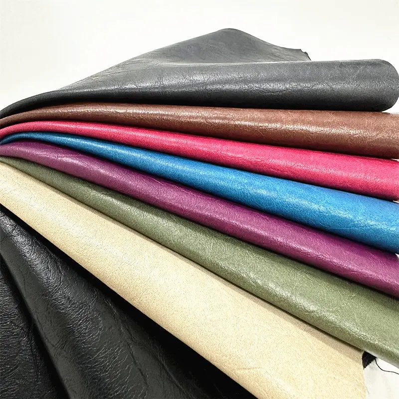 Konfeksiyon PU deri üreticisi ceketler ve giysiler için 0.6mm tasarımcı kumaş suni deri viskon desen