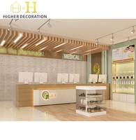 Conception de magasin de pharmacie, vitrine de présentation pour la vente au détail, comptoir de présentation personnalisé pour dispensaire, étagères de pharmacie pour l'affichage sur comptoir de pharmacie