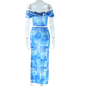 ชุดเซ็ต 2 ชิ้น เสื้อครอปเปิดไหล่พิมพ์ลาย กระโปรงผ่าข้าง แฟชั่นขายดี - Product Image 6