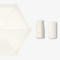 Mini parapluie portable à poche 6 plis pour femmes Nouvelle protection solaire ultra-légère à revêtement noir créatif pour la pluie de voyage
