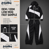 Ensemble décontracté deux pièces pour homme, haut à manches longues zippé noir et blanc avec blocs de couleur et pantalon à cordon de serrage, OEM ODM