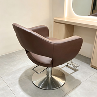 Fauteuil de salon moderne à accoudoirs creux, chaise de coiffure hydraulique avec repose-pieds