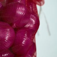 Waterbestendige geëmbosseerde mesh tas voor dadelfruit en groenteoogst