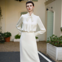 2024 hiver Style français chaud col fleuri longue lanterne manches Blouse ODM OEM coupe ajustée tempérament vêtements décontractés haut de gamme