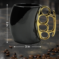 Tasse en forme de poings de boxeur - Tasse à café fantaisie en céramique noire et dorée pour l'autodéfense, Tasse unique en forme de poings de boxeur pour collectionneurs