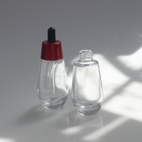 Flacon compte-gouttes en verre cylindrique pour huile essentielle cosmétique de luxe personnalisé 30 ml 50 ml avec bouchon rouge, flacon compte-gouttes en verre pour sérum cosmétique