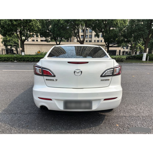 Guazi <span class=keywords><strong>Mazda</strong></span> <span class=keywords><strong>3</strong></span> <span class=keywords><strong>2015</strong></span> Sedán Usado Gasolina Automático Ejecutivo FWD Blanco Seminuevo Stock de Exportación para Concesionarios - Product Image 2