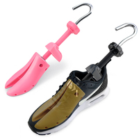 Support de chaussure en plastique civière de chaussure extenseur stéréotypes anti-rides arbre à chaussures universel mâle et femelle pieds gauche et droit
